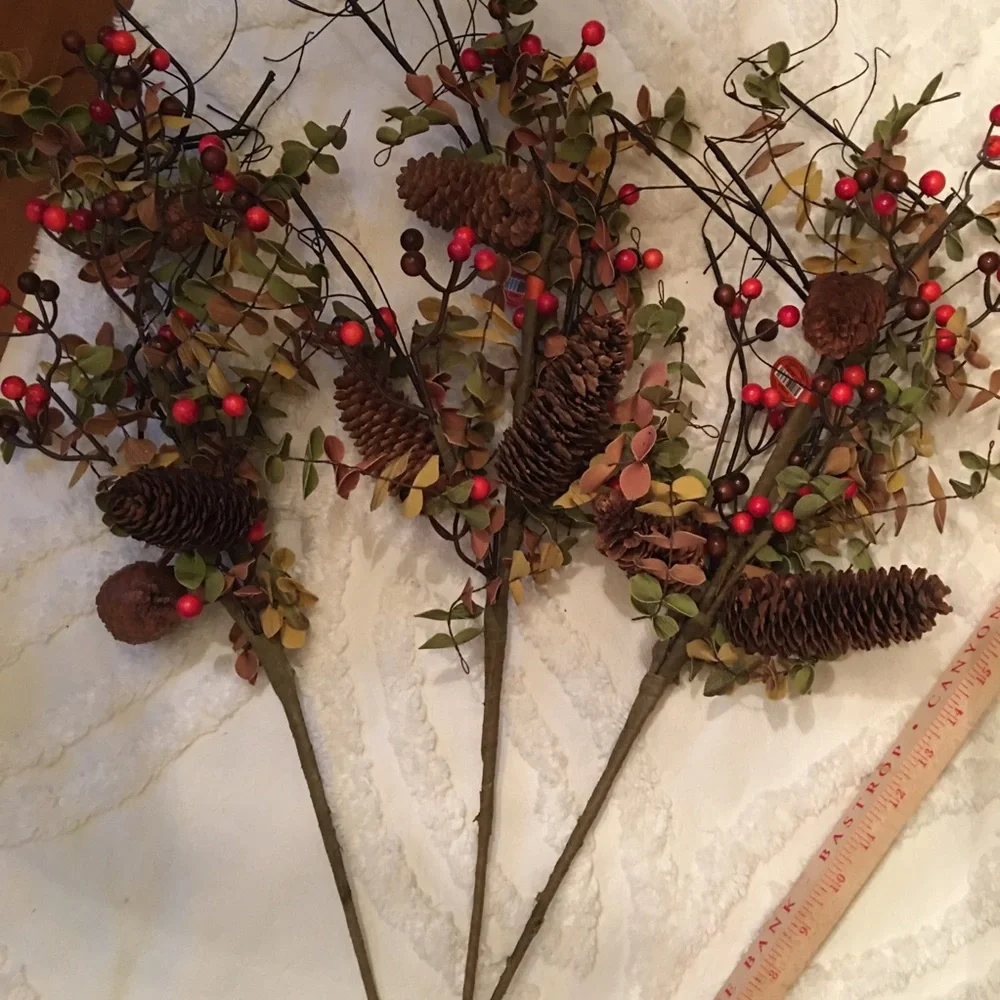 - Holiday berry and pine cone stems